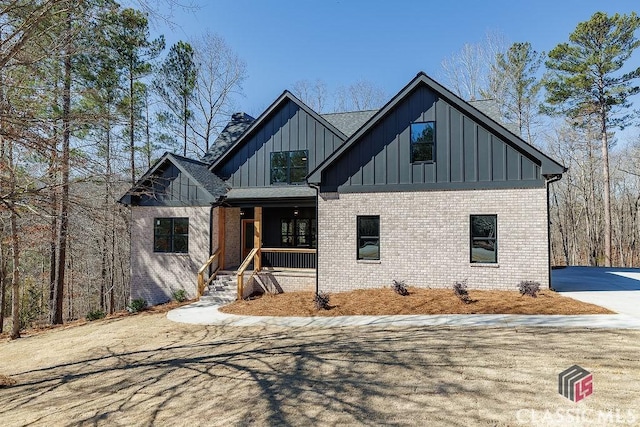 modern inspired farmhouse with a porch