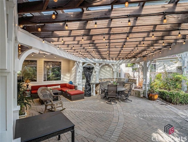 view of patio / terrace with outdoor dining space, a pergola, and an outdoor living space