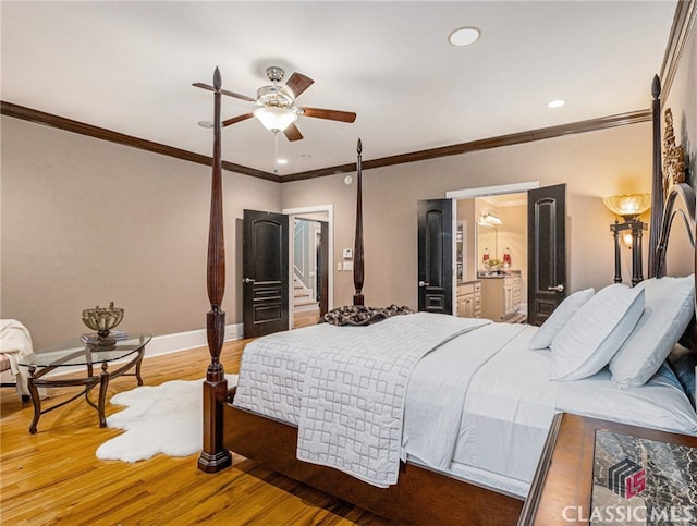 bedroom with ceiling fan, wood-type flooring, and crown molding