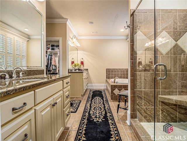 bathroom featuring vanity, separate shower and tub, and crown molding