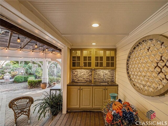 additional living space with ceiling fan, lofted ceiling, carpet flooring, and baseboards