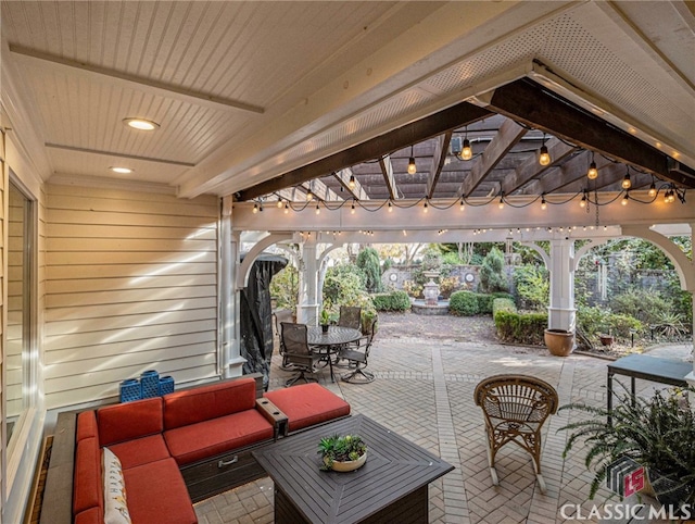 view of patio featuring a gazebo and an outdoor hangout area