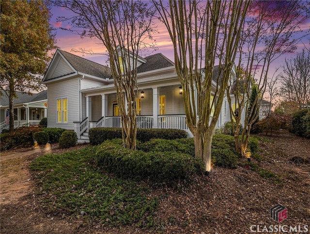 view of front of property featuring covered porch