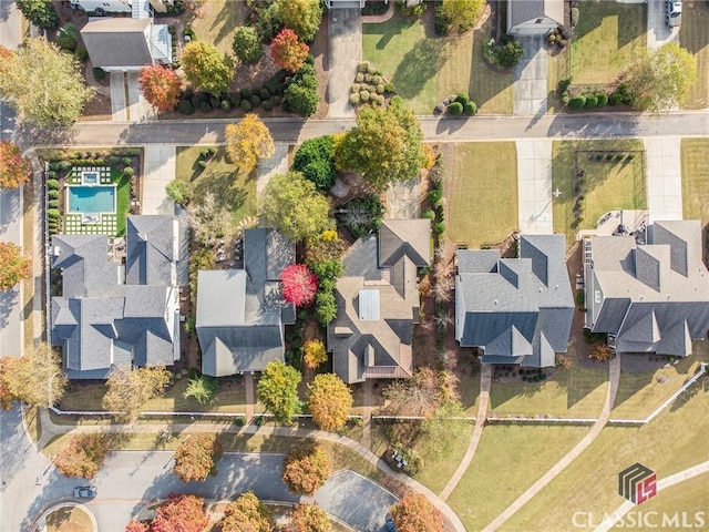 aerial view of residential area with property boundaries highlighted