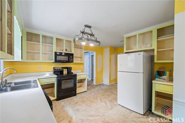 kitchen with sink, black appliances, and pendant lighting