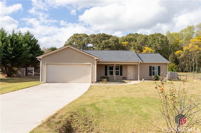 ranch-style house featuring a front lawn and a garage