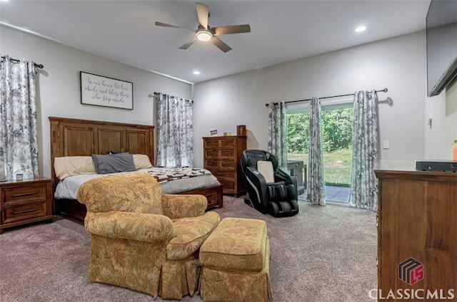 bedroom featuring access to exterior, light colored carpet, and ceiling fan