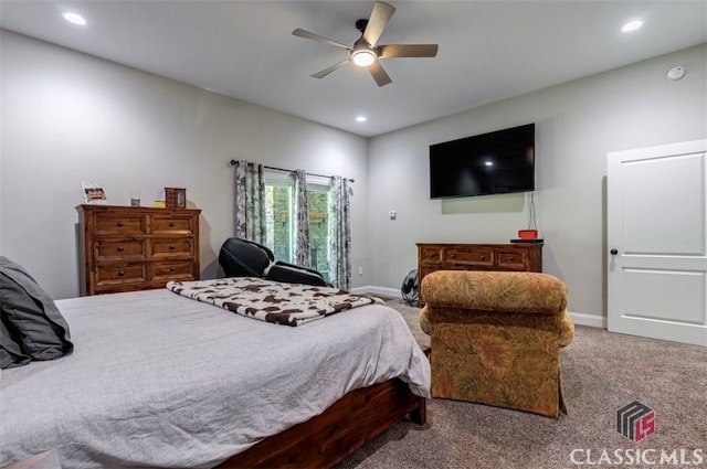 carpeted bedroom with ceiling fan