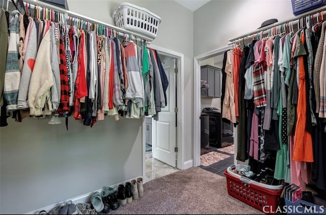 spacious closet featuring carpet floors