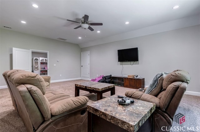 carpeted living room featuring ceiling fan