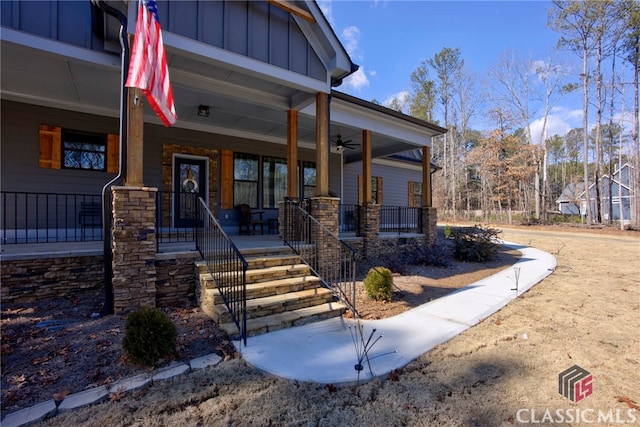 doorway to property with ceiling fan and covered porch