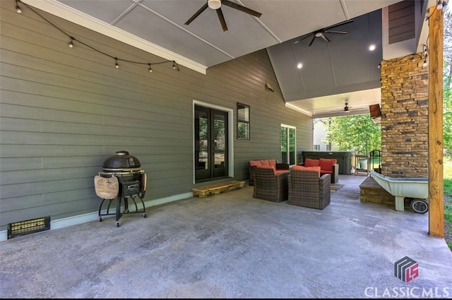 view of patio featuring an outdoor hangout area and ceiling fan