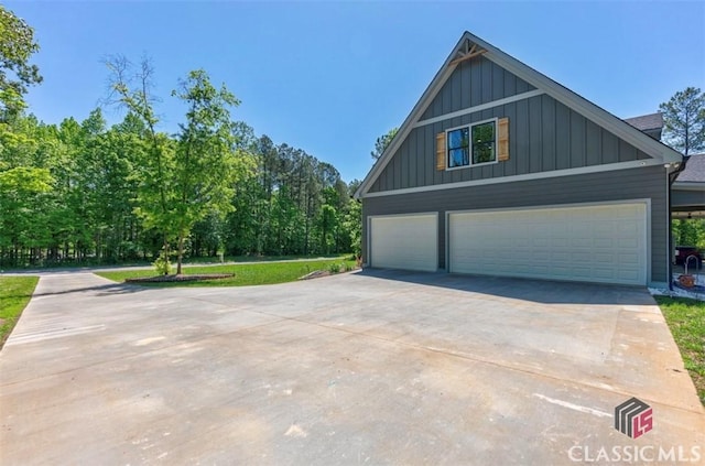 view of property exterior with a garage