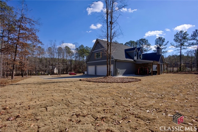 view of home's exterior with a garage