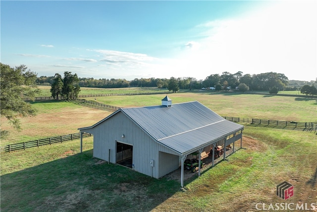 birds eye view of property featuring a rural view