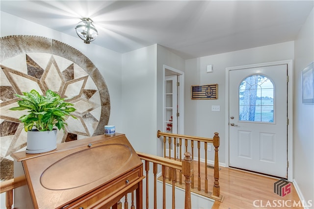 foyer with light hardwood / wood-style flooring