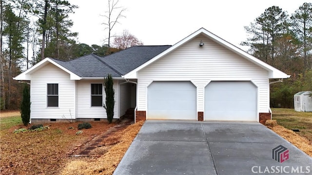 single story home featuring a garage