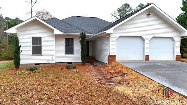 single story home featuring a garage