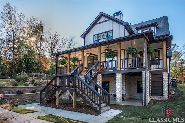 view of play area with ceiling fan, a patio, and central AC