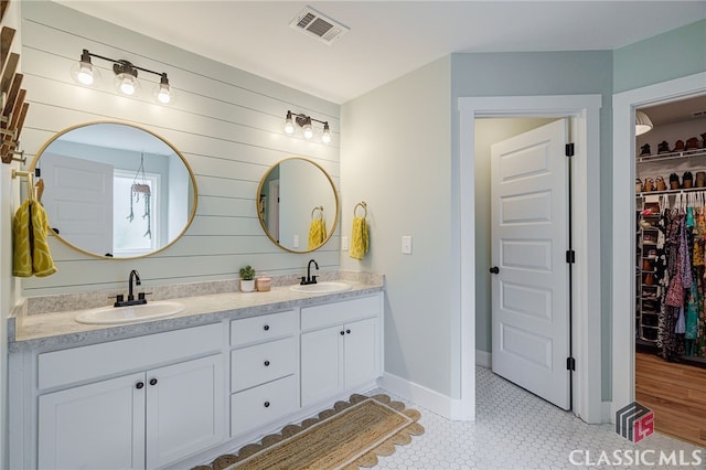 bathroom featuring vanity and wood-type flooring