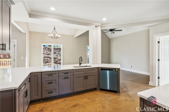 kitchen with dishwasher, ceiling fan with notable chandelier, sink, hanging light fixtures, and light hardwood / wood-style floors