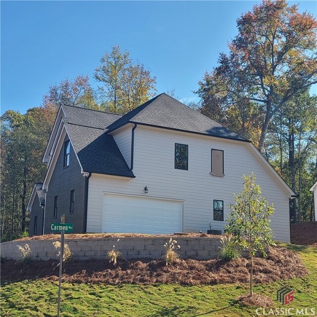 view of home's exterior featuring a garage