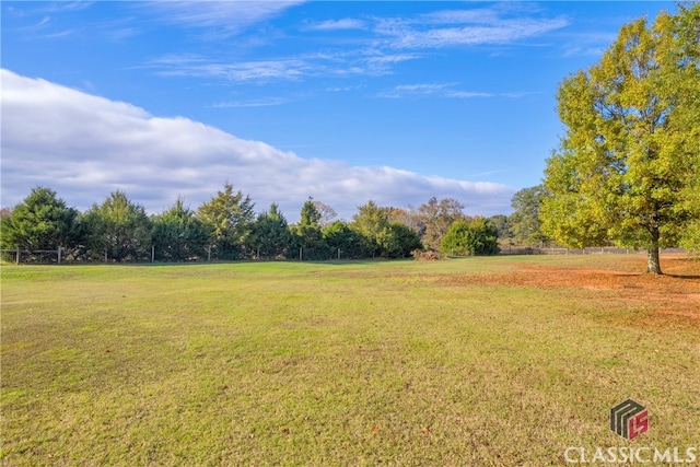 view of yard with a rural view