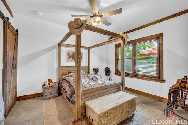 bedroom with a barn door and ceiling fan