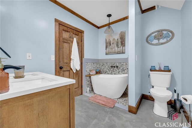 bathroom featuring concrete flooring, a bathing tub, ornamental molding, vanity, and toilet