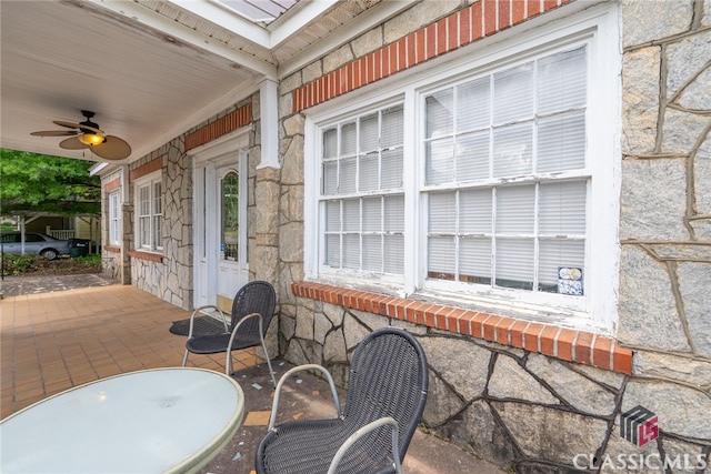 view of patio / terrace featuring ceiling fan