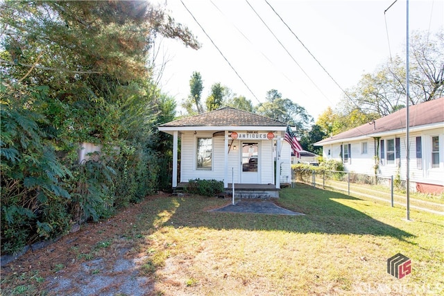 exterior space with a front lawn