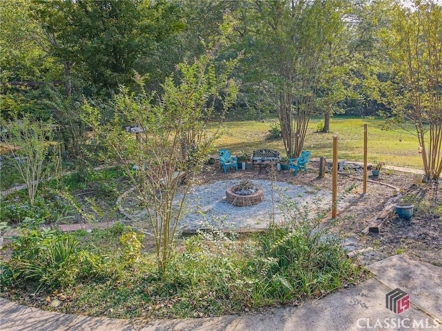 1104 Farm Rd, Colbert, GA 30628 - view of yard with a fire pit
