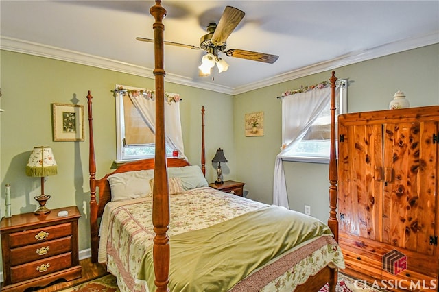 bedroom featuring hardwood / wood-style floors, ceiling fan, and ornamental molding