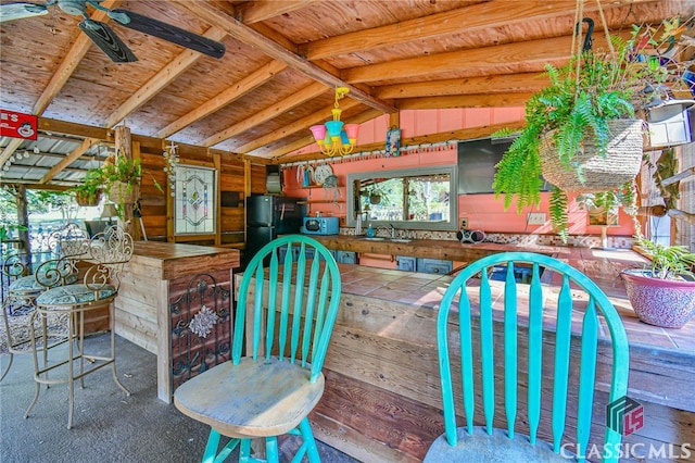 view of patio with ceiling fan