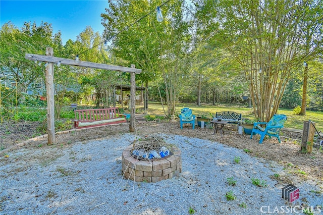 view of patio featuring a fire pit