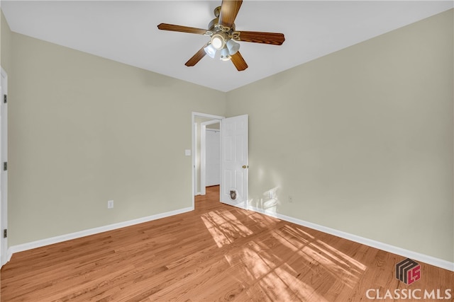 unfurnished bedroom featuring ceiling fan and light hardwood / wood-style floors