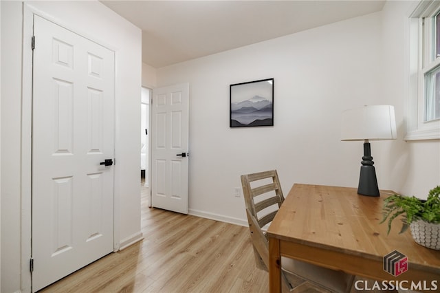office space with light hardwood / wood-style floors