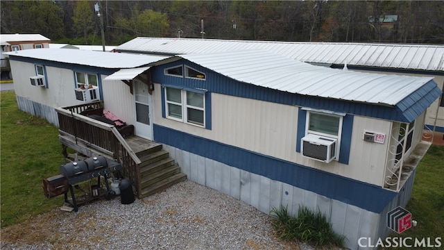 view of property exterior with cooling unit