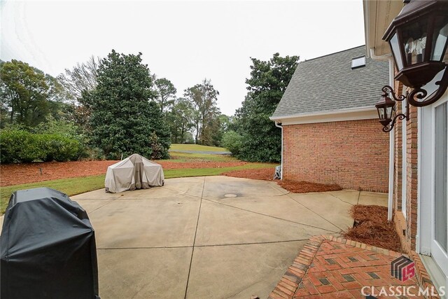 view of patio / terrace featuring a grill