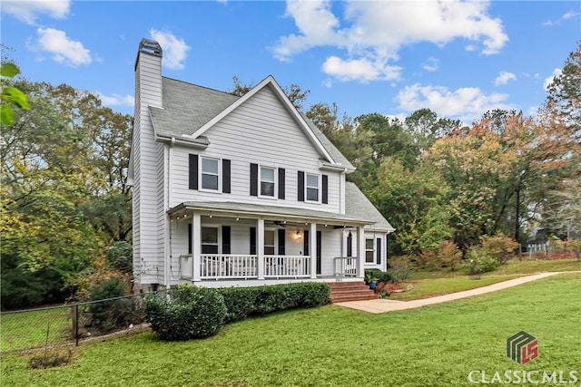 view of front of home featuring a porch and a front yard