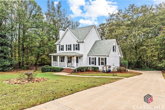 view of front of home featuring a porch and a front lawn