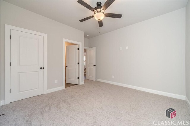 hall with light hardwood / wood-style flooring and crown molding