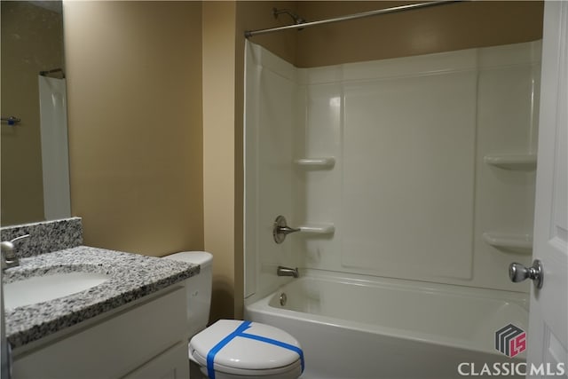 full bathroom with vanity, shower / bathtub combination, and toilet