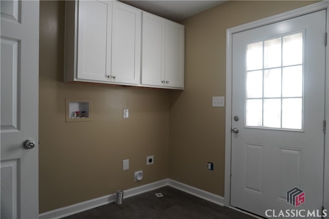 laundry room featuring hookup for an electric dryer, hookup for a washing machine, dark hardwood / wood-style flooring, and cabinets