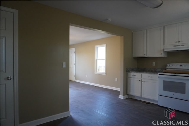 kitchen with white cabinets, white electric range oven, dark hardwood / wood-style floors, and light stone countertops