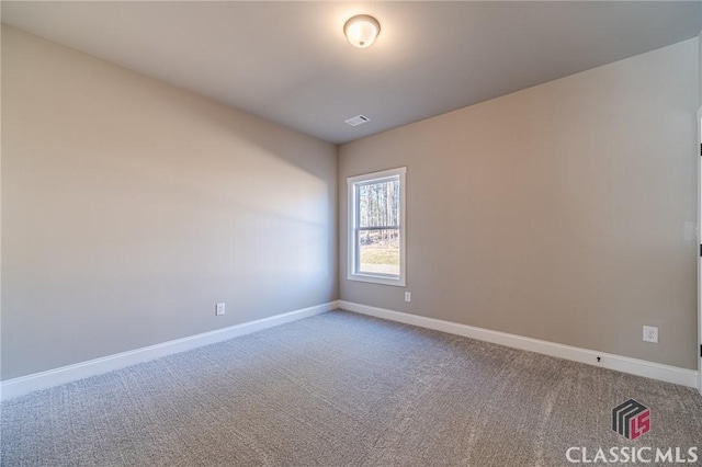 unfurnished room with carpet