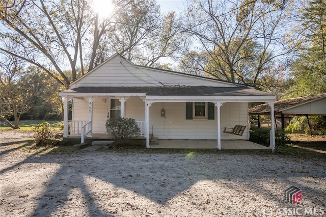 view of front of property featuring covered porch