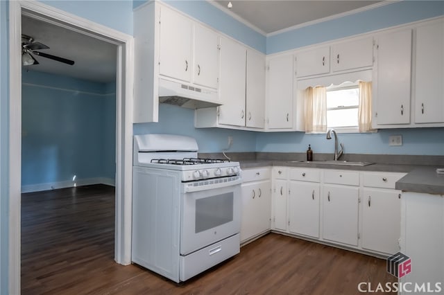 kitchen with crown molding, sink, dark hardwood / wood-style floors, white cabinetry, and white gas stove