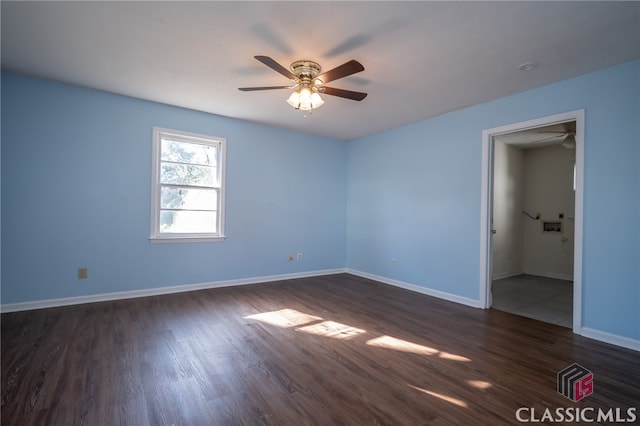 unfurnished bedroom with dark hardwood / wood-style floors and ceiling fan