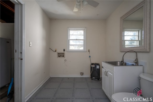 clothes washing area with washer hookup, ceiling fan, and sink